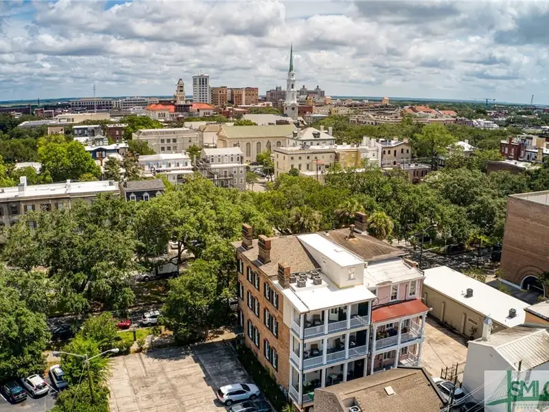 Restored 1871 Gray Brick Townhome in Savannah’s Historic District with Carriage House and Stvr Certificates