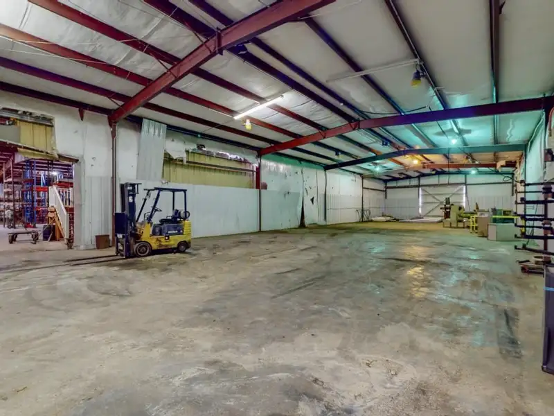 Commercial Property on Busy Highway - 2.1 Acres, 31,000 Sq Ft with Offices and Roll-up Doors