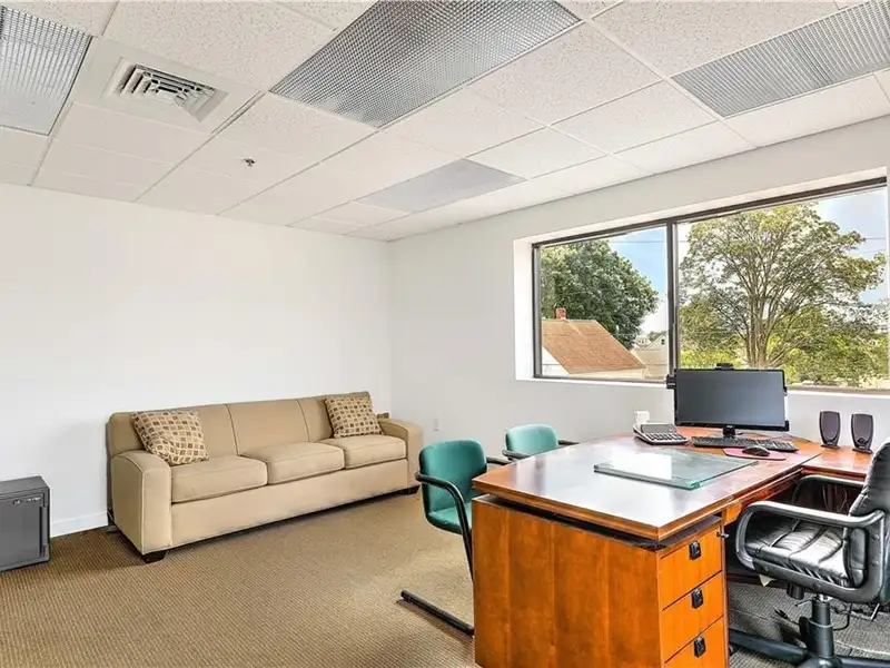 Versatile Multi-level Commercial Building with High Visibility on Major Corridor