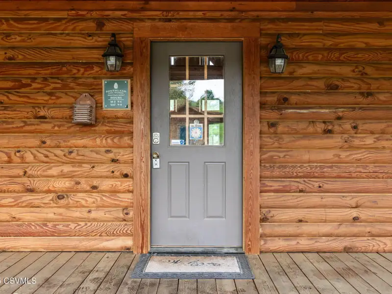 Commercial Log Home on 2 Acres with 3 Bedrooms and Scenic Views