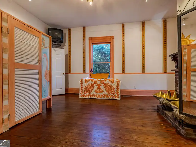 Versatile Commercial Building Near Downtown with Parking and Apartment Potential