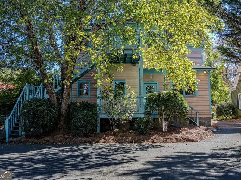 Versatile Commercial Building Near Downtown with Parking and Apartment Potential
