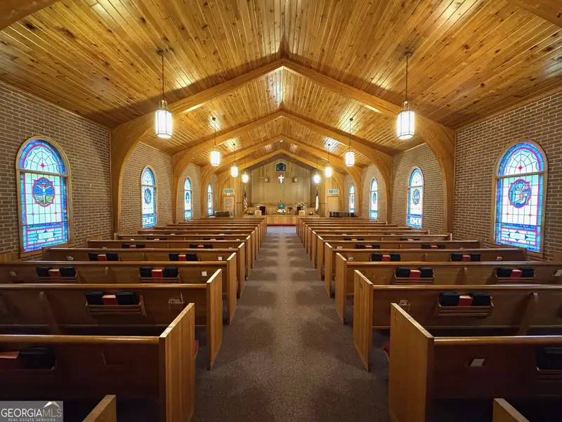 Multi-use Church Property with Sanctuary, Classrooms, Fellowship Hall, and Ample Parking