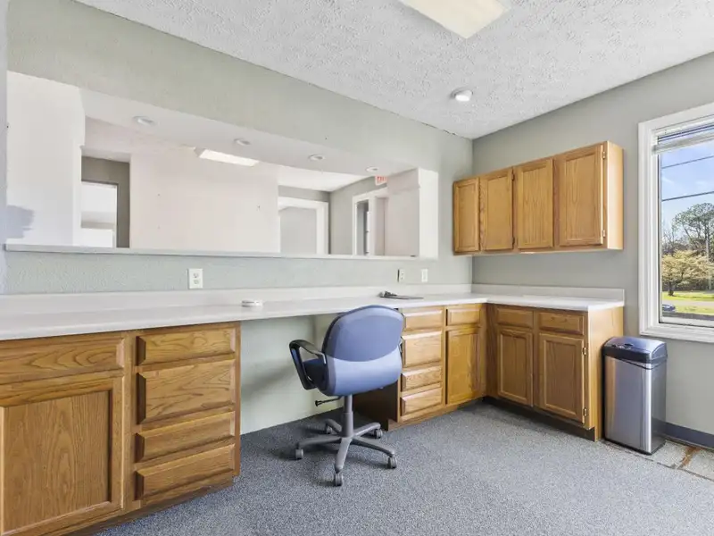 Versatile 4,305 Sq Ft Office Building with Apartment on Highway 11e