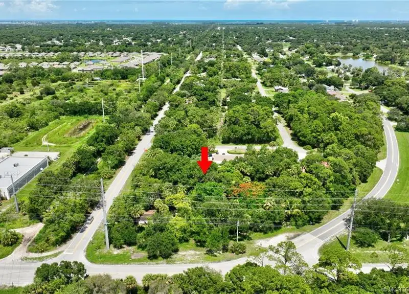 Commercial Corner Lot with Existing Residence in Lakewood Park, 31,140 Sq Ft