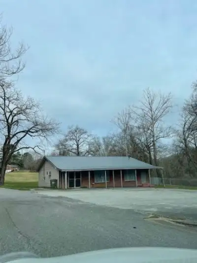 Versatile Former Restaurant on 2.4 Acres with Creek Access, Ideal for Development