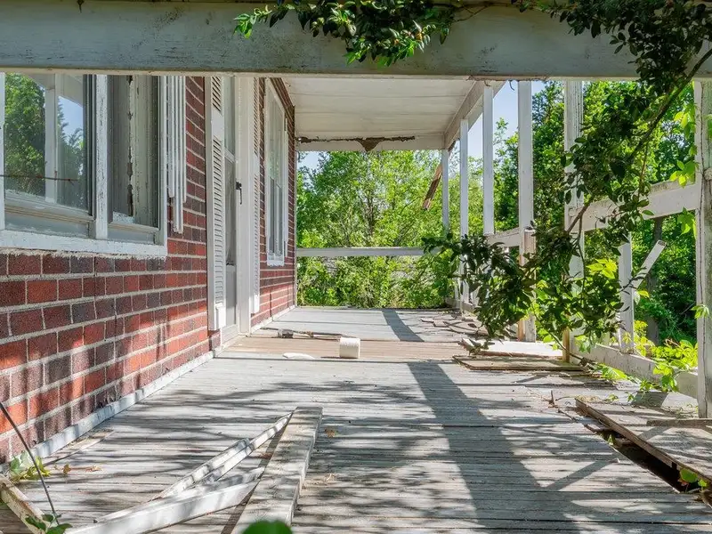 Classic American Foursquare Home in Need of Restoration with Detached Garage