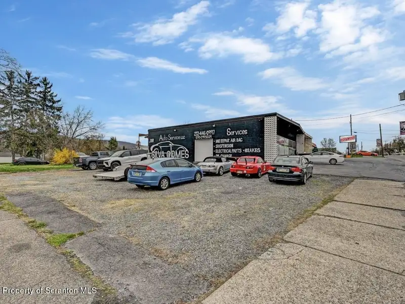 Mixed-use Building with Retail Space and Parking for Sale in Prime Location