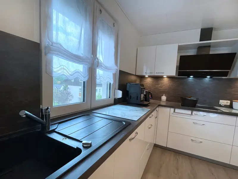 Modernized Detached House with Commercial Space in Family-friendly Location