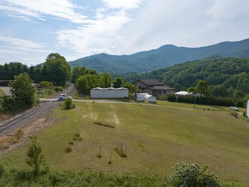 Historic 1918 Stone Building with 3.99 Acres and Detached Workshop in Balsam Road Area