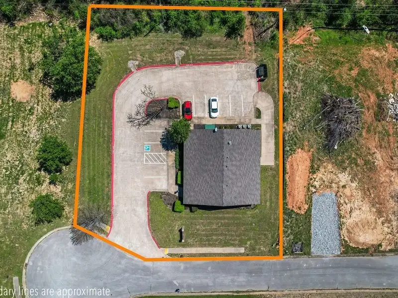 Versatile 2,752 Sq Ft Office Building in Central Rogers with Five Private Offices
