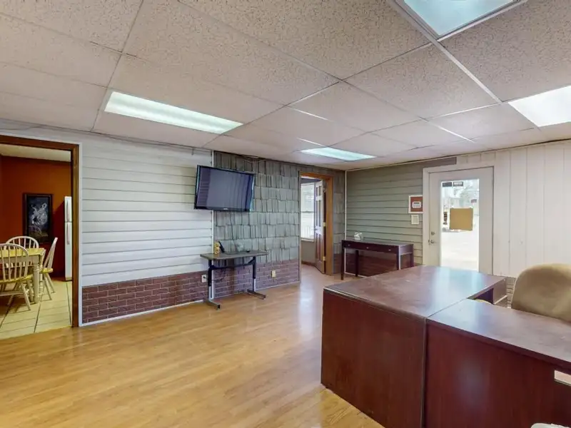 Commercial Property on Busy Highway - 2.1 Acres, 31,000 Sq Ft with Offices and Roll-up Doors