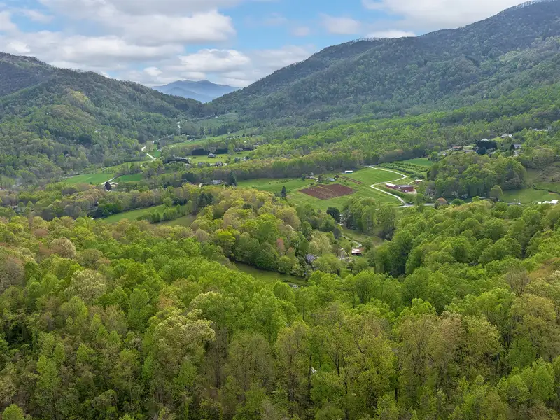 25+ Acre Pastoral Property with Pond and Mountain Views Near Downtown Waynesville