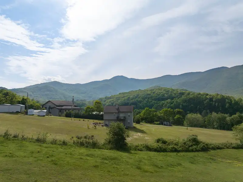 Historic 1918 Stone Building with 3.99 Acres and Detached Workshop in Balsam Road Area