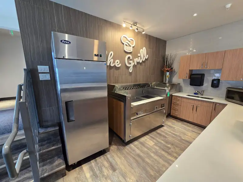Fully Equipped Commercial Kitchen and Dining Space in Downtown Location