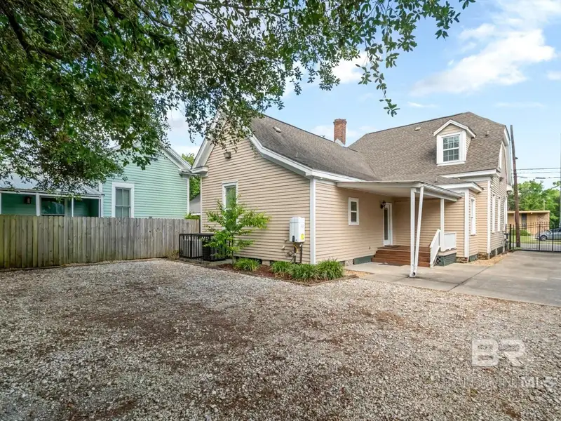 Mixed-use Property in Downtown Mobile, Alabama with High Ceilings and Hardwood Floors
