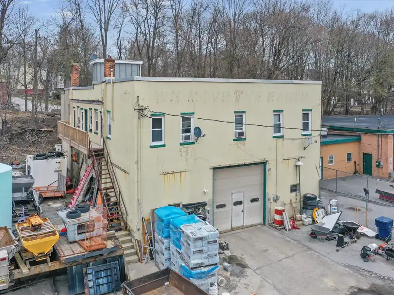 Mixed-use Property with Office, Garage, and Fully Rented Apartments in Middletown