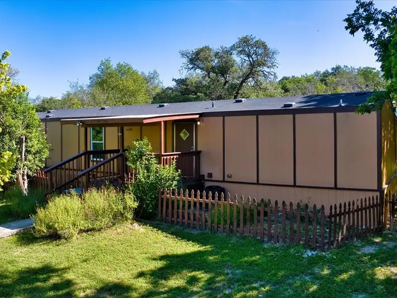 10-acre Mobile Home Community with 5 Units, Fenced, Workshop, and Growth Potential