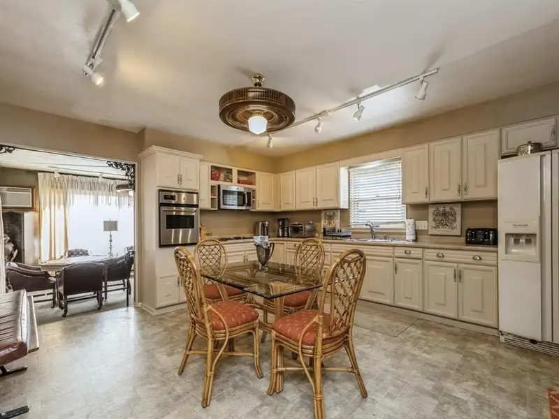 Vintage 4-bedroom Beaverdale Brick Home with Office Suites in Historic Valley Junction