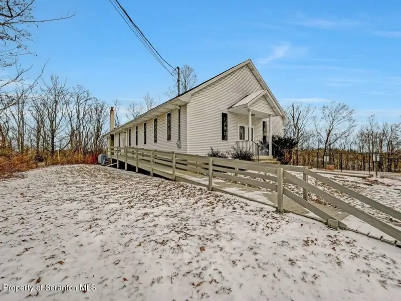 Versatile Former Church Building in Peaceful Location with Ample Parking and Creative Potential