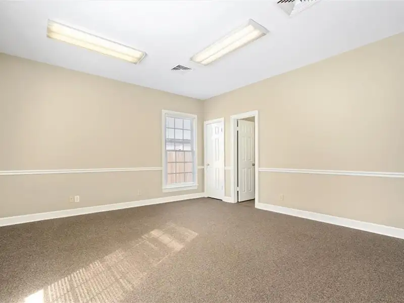 Updated Office Space for Rent in Piccadilly Square with Four Offices and Reception Area