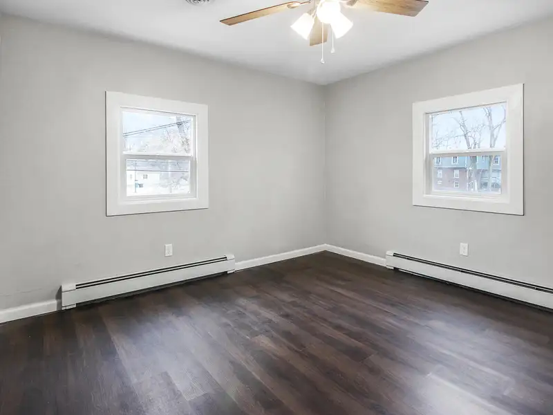 Mixed-use Two Unit Building with Remodeled Three Bedroom Apartment in Prime Location