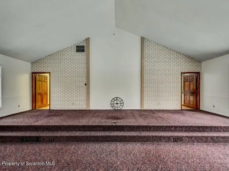 Versatile Former Church Building in Peaceful Location with Ample Parking and Creative Potential