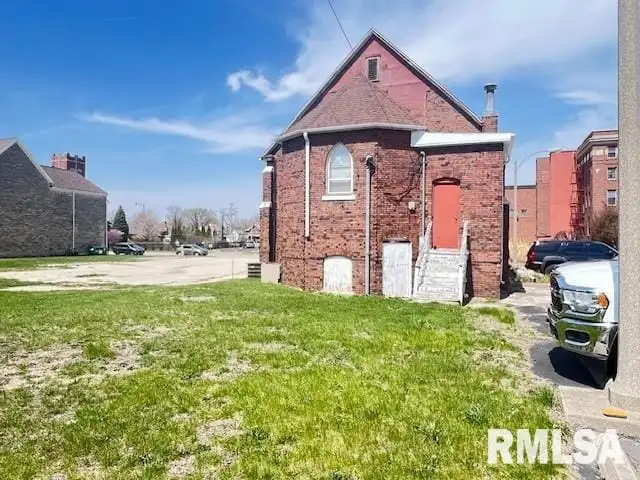 Historic Church Property for Sale in Desirable Neighborhood with Versatile Community Spaces