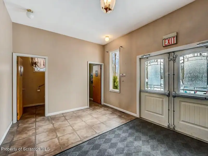 Versatile Former Church Building in Peaceful Location with Ample Parking and Creative Potential