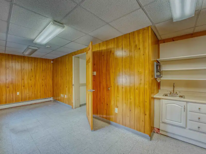 Versatile Mixed-use Property on Cottage Street, Littleton with Office Spaces and Barn