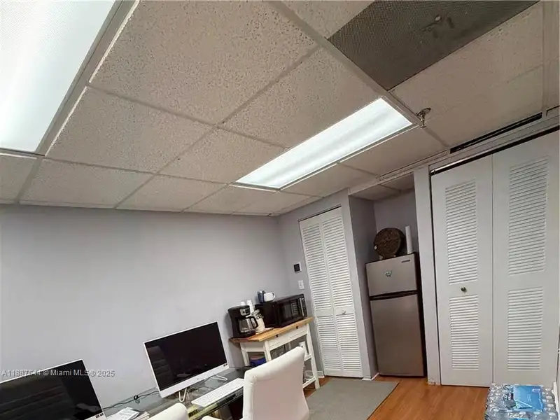 Well-maintained Office Space Near Coral Gables with Natural Light and Three Private Rooms