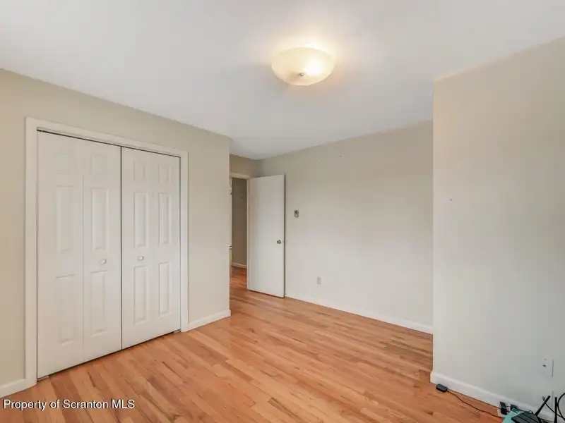 Mixed-use Property in Throop: 7-bay Garage and Updated 2-bedroom Apartment