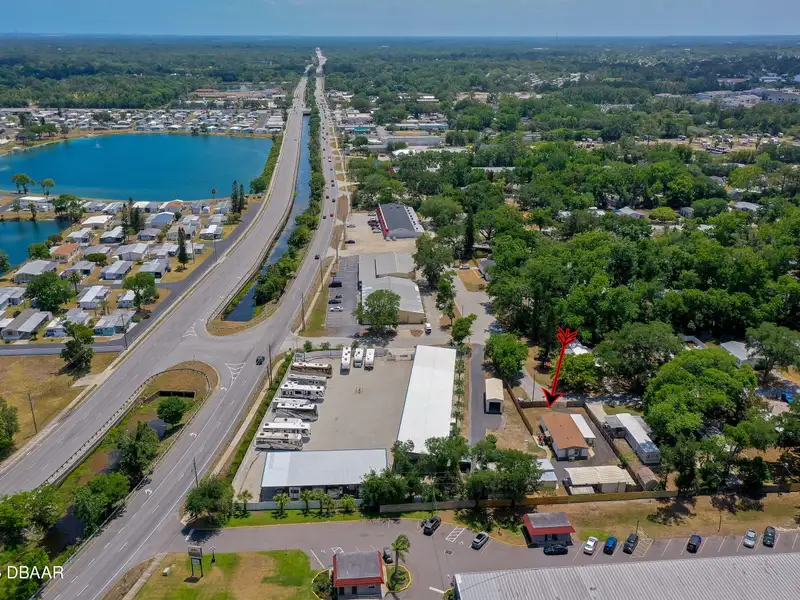 Mixed Use Property: Light Industrial Lot with Adjoining Residential Home and Expansion Potential