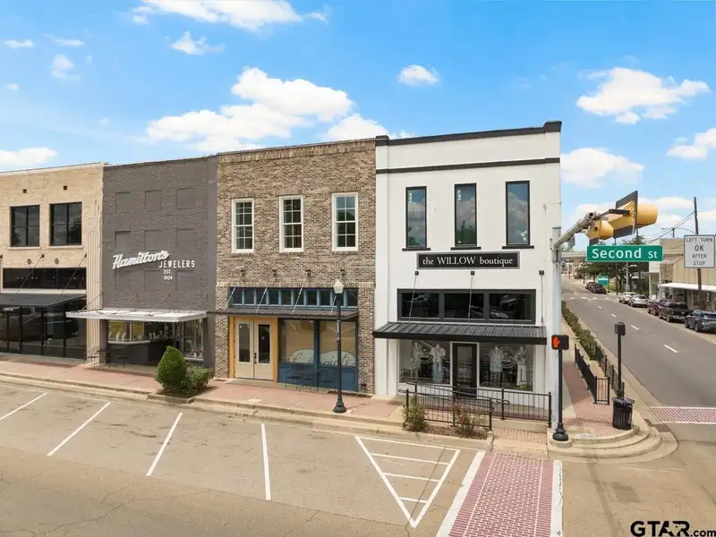 Unfinished Downtown Commercial Building with High Traffic Visibility and Mixed-use Potential