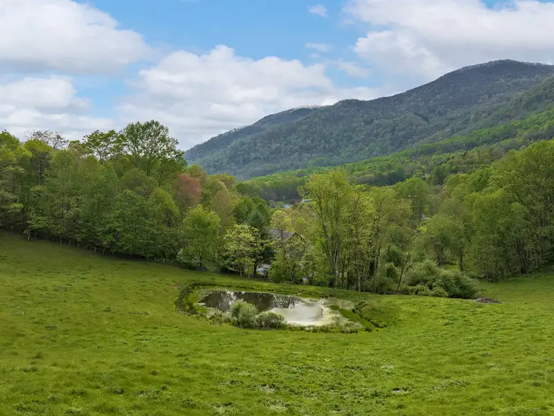 25+ Acre Pastoral Property with Pond and Mountain Views Near Downtown Waynesville