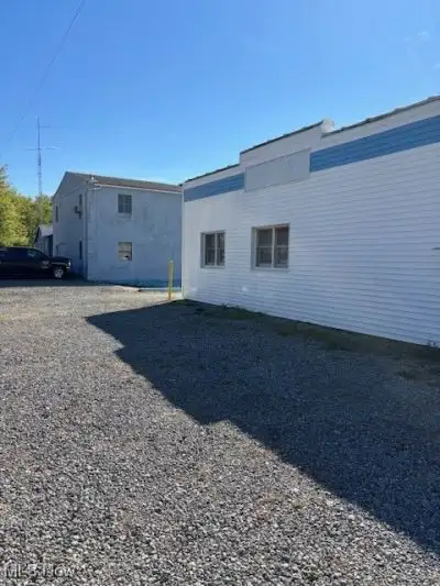 Multi-parcel Commercial Property with Storage and Rustic Office Space on 0.76 Acres