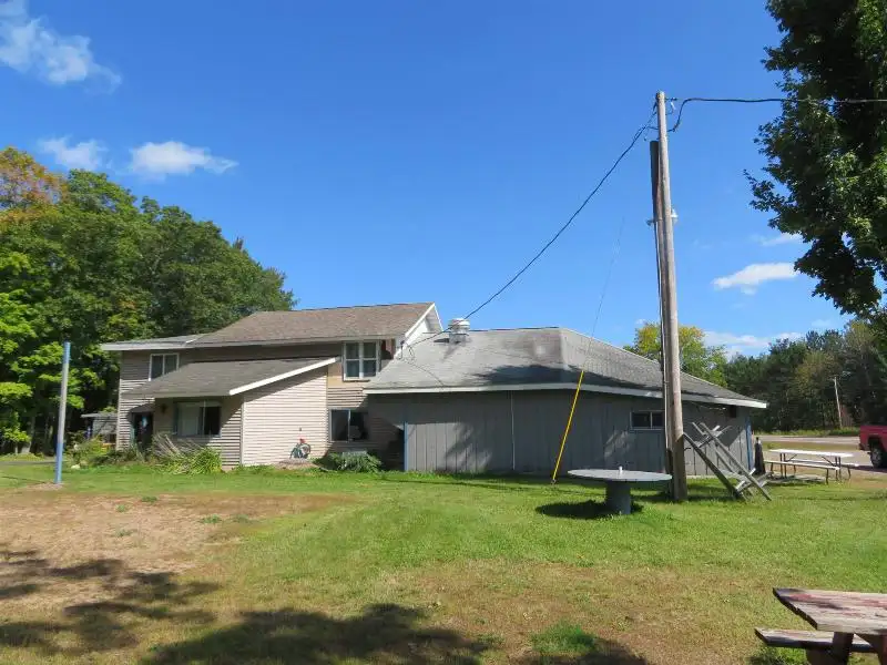 Turnkey Bar/restaurant with Apartment, Highway Access, and Development Potential in Northwoods