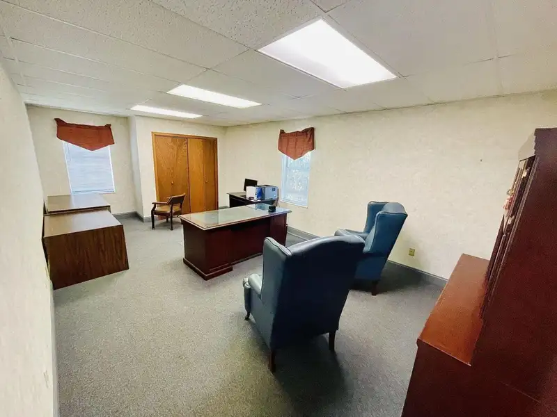 Office Building in Morristown with 6 Offices, Parking, and Unfinished Basement
