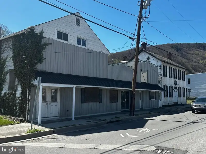 Large Commercial Building with Unique Floor Plan and Adjacent City-owned Lot for Sale