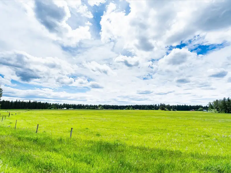 Expansive 50-acre Development Site Near Glacier National Park with Riverfront Access