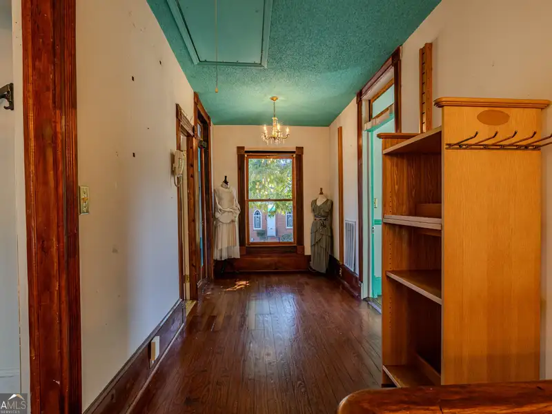 Versatile Commercial Building Near Downtown with Parking and Apartment Potential