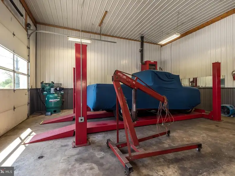 Auto Repair Shop with Residential Income Opportunity in Prime Location