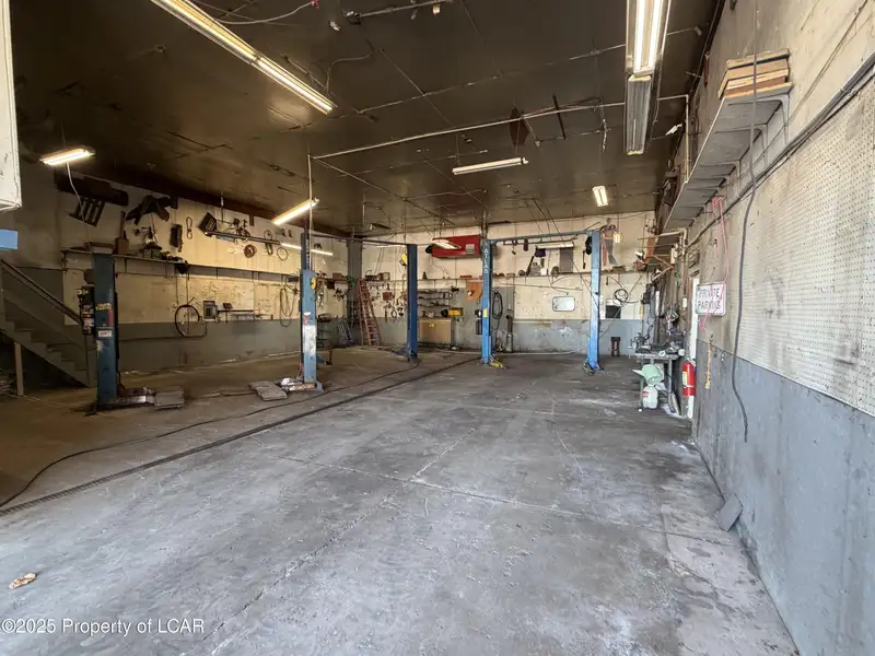 For Lease: 2,400 Sf Garage/warehouse with Office and Three Vehicle Lifts