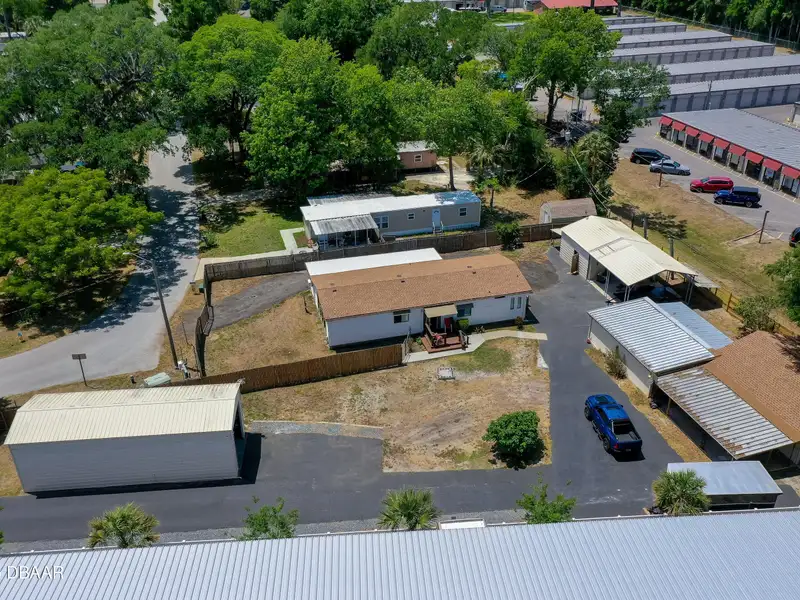 Mixed Use Property: Light Industrial Lot with Adjoining Residential Home and Expansion Potential