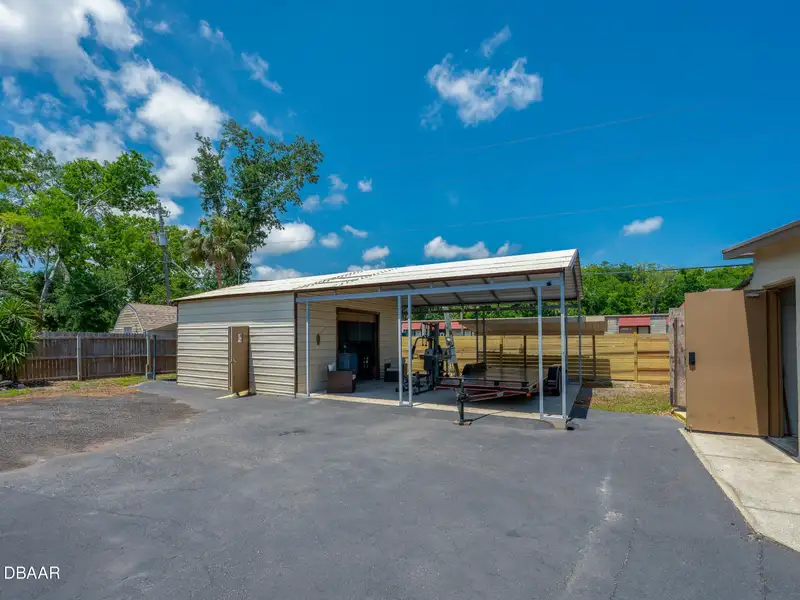 Mixed Use Property: Light Industrial Lot with Adjoining Residential Home and Expansion Potential