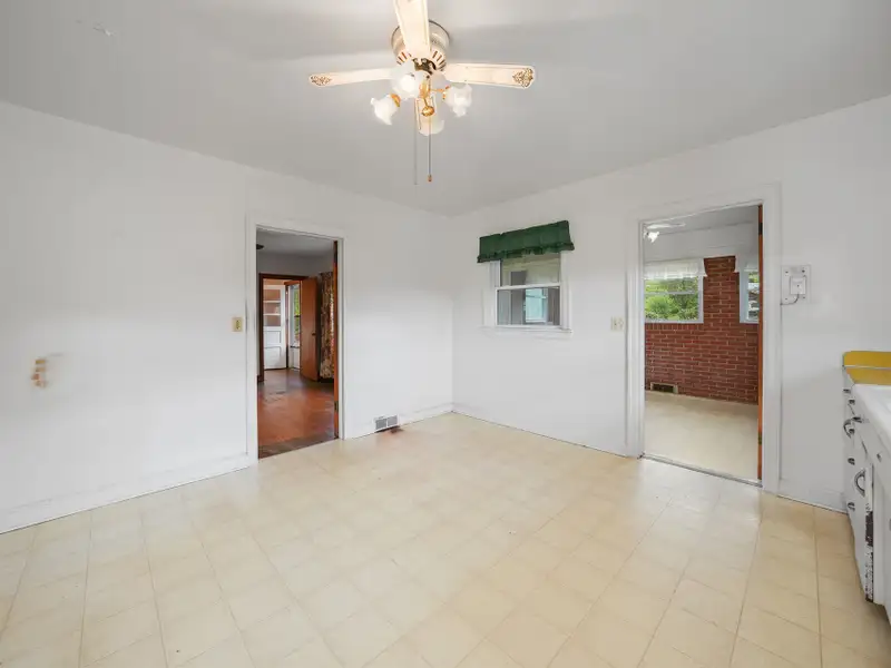Prime 2.58-acre Multifunctional Property with Ranch Home and Outbuildings Near High-traffic Area