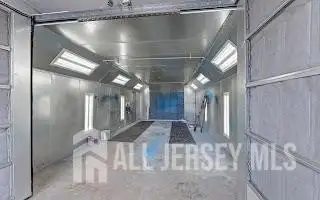 Turnkey Automotive Business with Car Dealership, Mechanic & Auto Body Shop in Prime Location