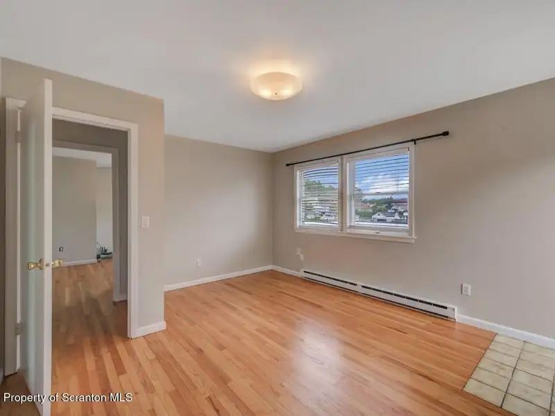 Mixed-use Property in Throop: 7-bay Garage and Updated 2-bedroom Apartment