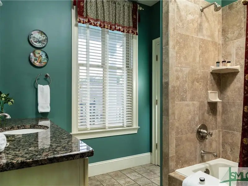 Restored 1871 Gray Brick Townhome in Savannah’s Historic District with Carriage House and Stvr Certificates