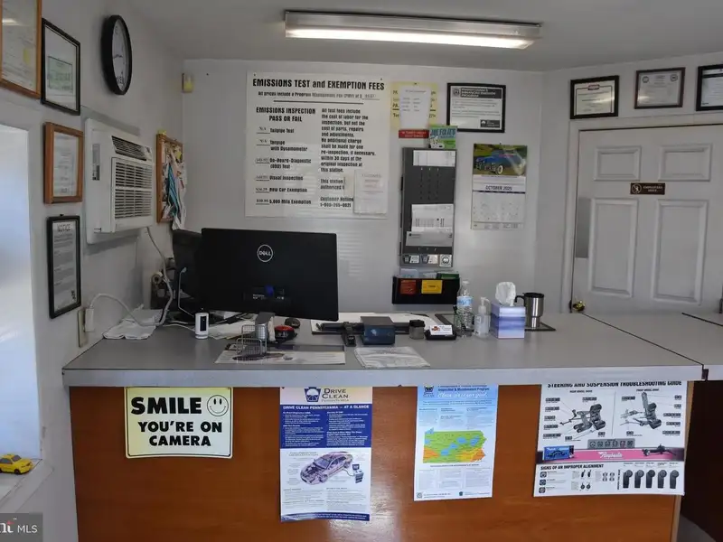 Versatile 3000+ Sq Ft Commercial Space in Prime Village Location with Auto Repair Facilities